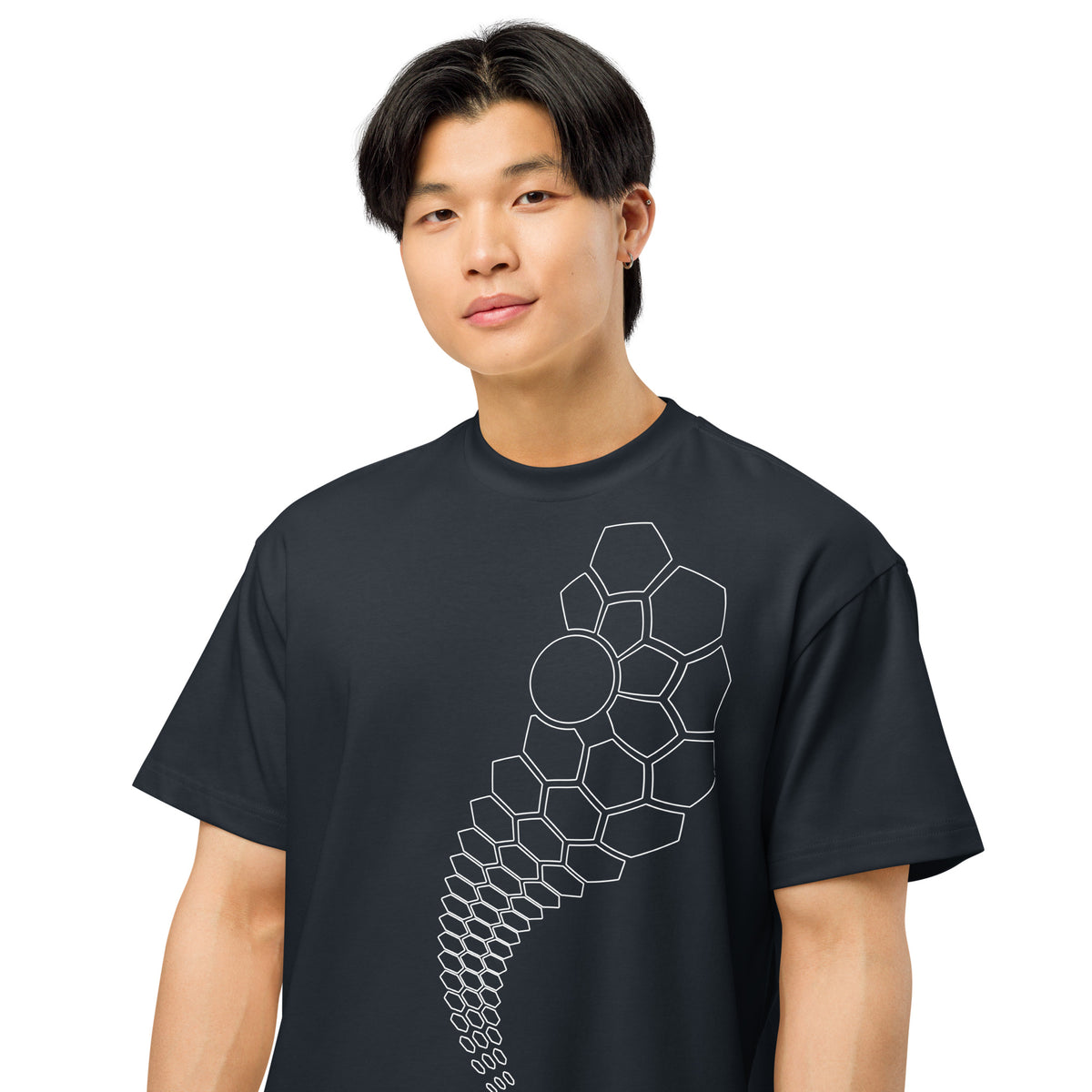 Hexa B&W cotton box t-shirt in Navy Blazer, front view on a model: white hexagon outlines and one circle on the left chest