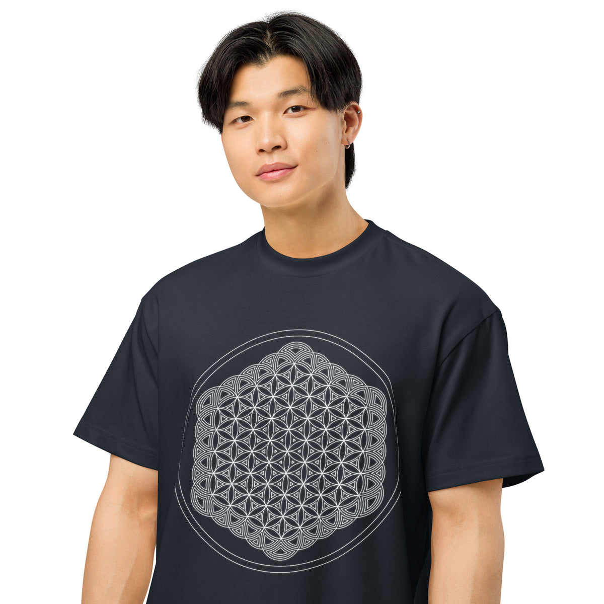 Life of a Flower B&W cotton box t-shirt in Navy Blazer, close front view on a model: white six-petal flowers and arcs