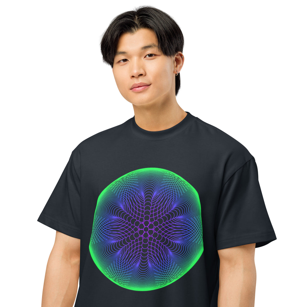 Star Weave cotton box t-shirt in Navy Blazer, close front view on a model: six arms of stacked circles inside a green rim