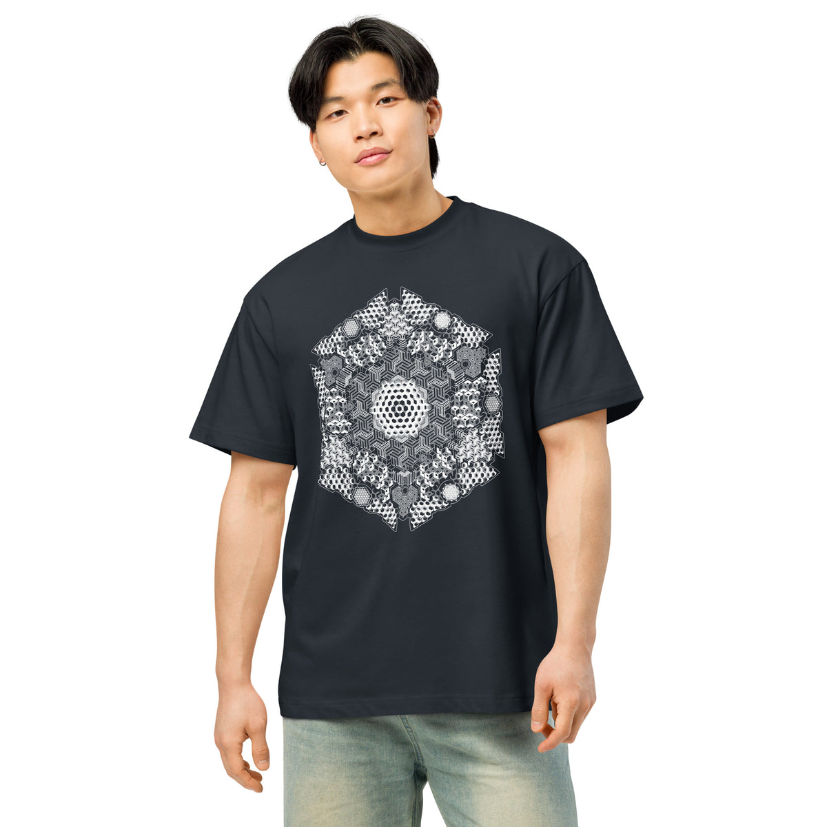GeoMaster B&W cotton box t-shirt in Navy Blazer, front on a person: large white and grey hexagon print on the chest