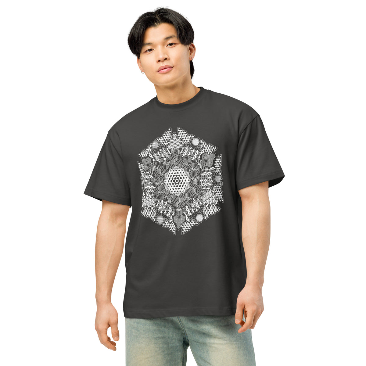 GeoMaster B&W cotton box t-shirt in Vintage Black, front on a person: large white and grey hexagon print on the chest