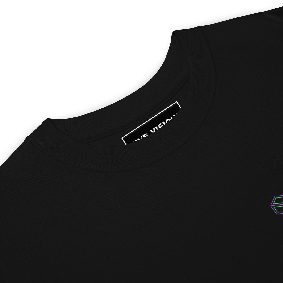 Neural Star Tree premium heavyweight t-shirt in Black, close-up at the collar: the HIVE VISIONS neck label