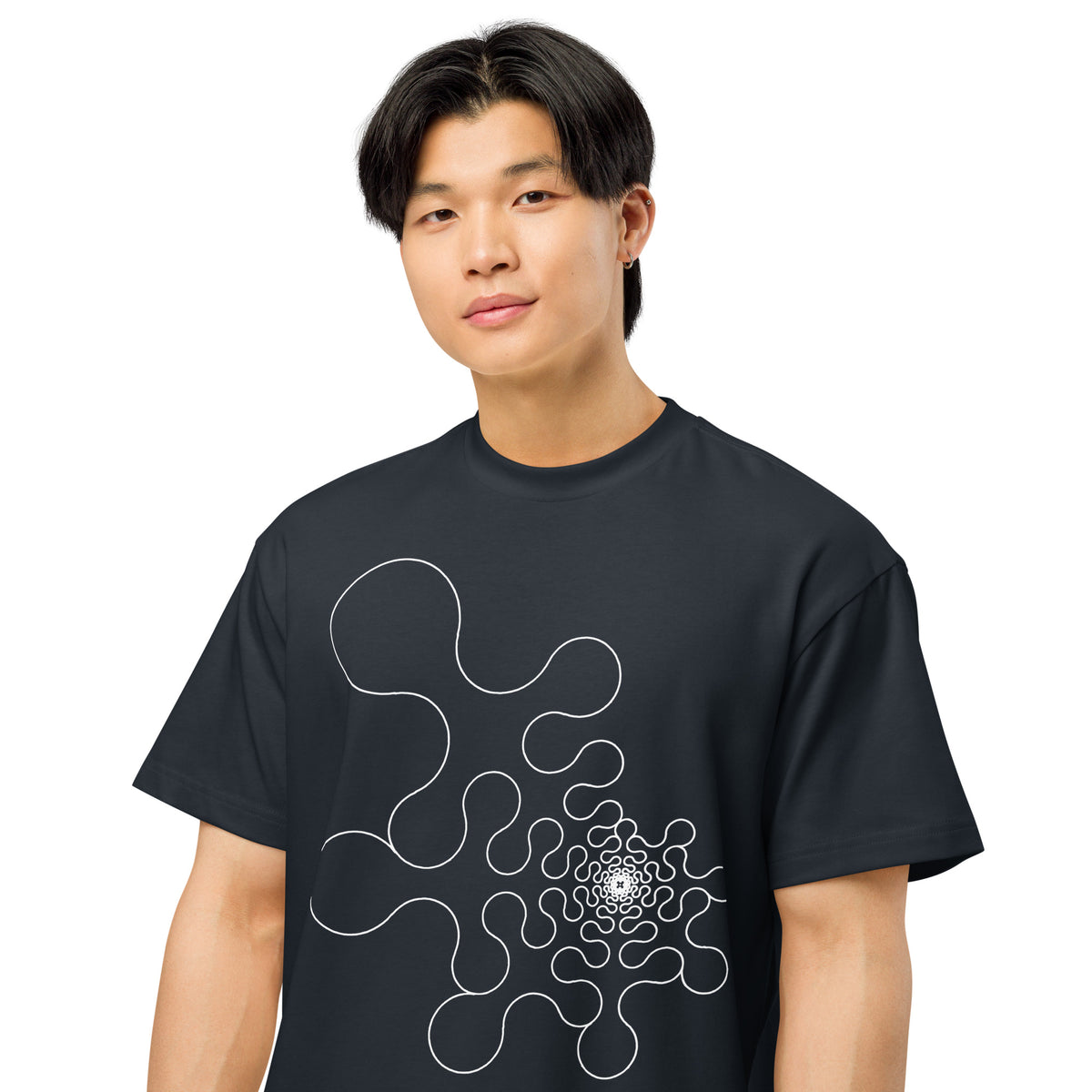 Metaball B&W cotton box t-shirt in Navy Blazer, close front view on a model: rounded lobes tightening into a dense core