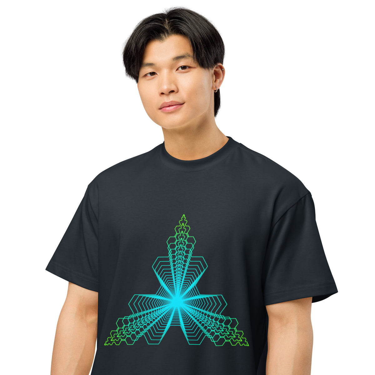 Fractal Triangle cotton box t-shirt in Navy Blazer, on a model, close: hexagon lines meeting in a turquoise centre