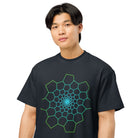Fibonacci Sequence 1 cotton box t-shirt in Navy Blazer, close front view on a model: green and cyan spiral of cells