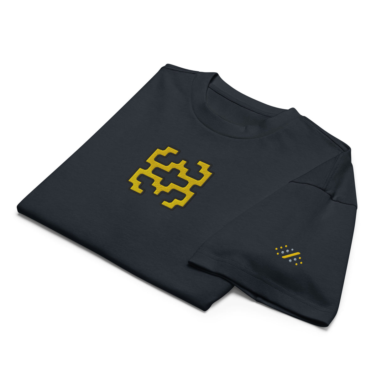 Invaders embroidered box tee in Navy Blazer, folded, detail: golden yellow figure, yellow and grey dot mark on the sleeve