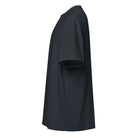 Birth cotton box t-shirt in Navy Blazer, left side view: drop shoulder sleeve and the edge of the front print