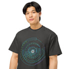 Hex Core cotton box t-shirt in Vintage Black, close front view on a model: white hexagon sphere inside turquoise rings