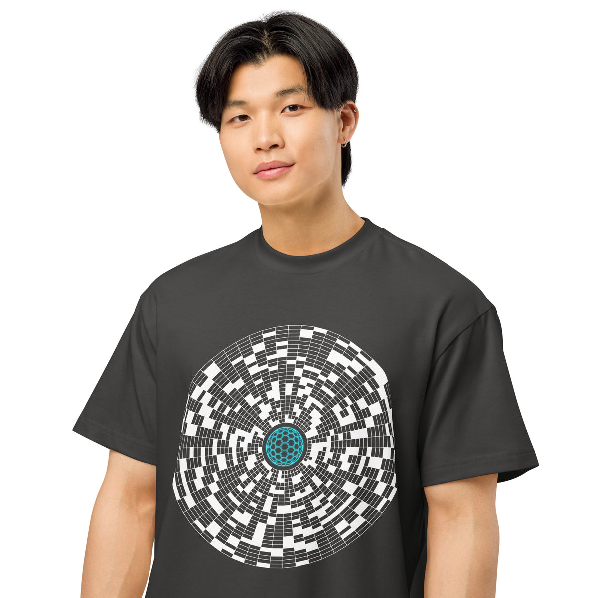 Broken Hex Core cotton box t-shirt in Vintage Black, close front view on a model: turquoise hexagon sphere in white cells