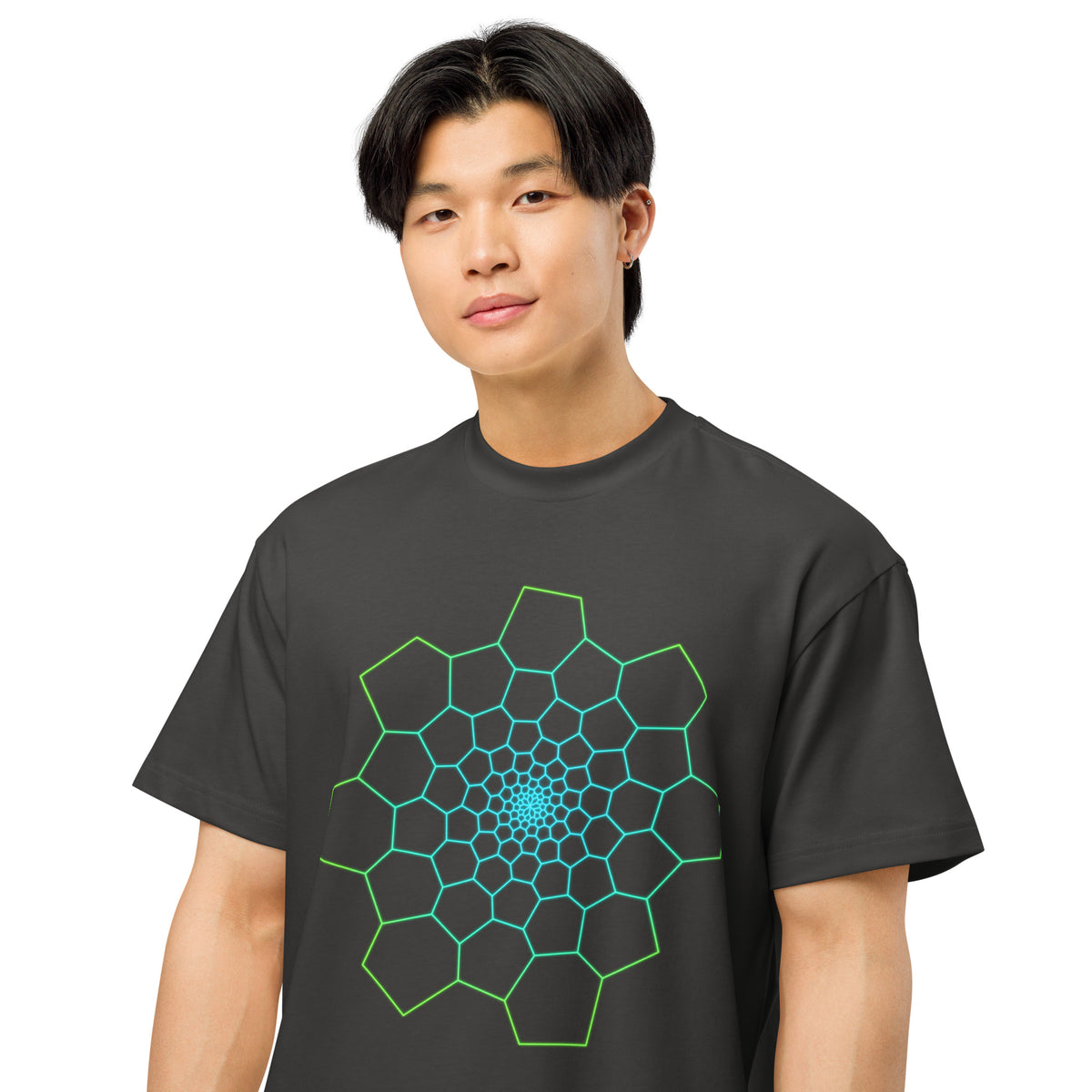 Fibonacci Sequence 1 cotton box t-shirt in Vintage Black, close front view on a model: green and cyan spiral of cells