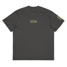 Owl embroidered box tee in Vintage Black, flat front: small owl face on the chest, yellow and white mark on the left sleeve