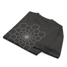 Fibonacci Sequence 1 B&W cotton box t-shirt in Vintage Black, folded: white spiral of cells around a bright centre