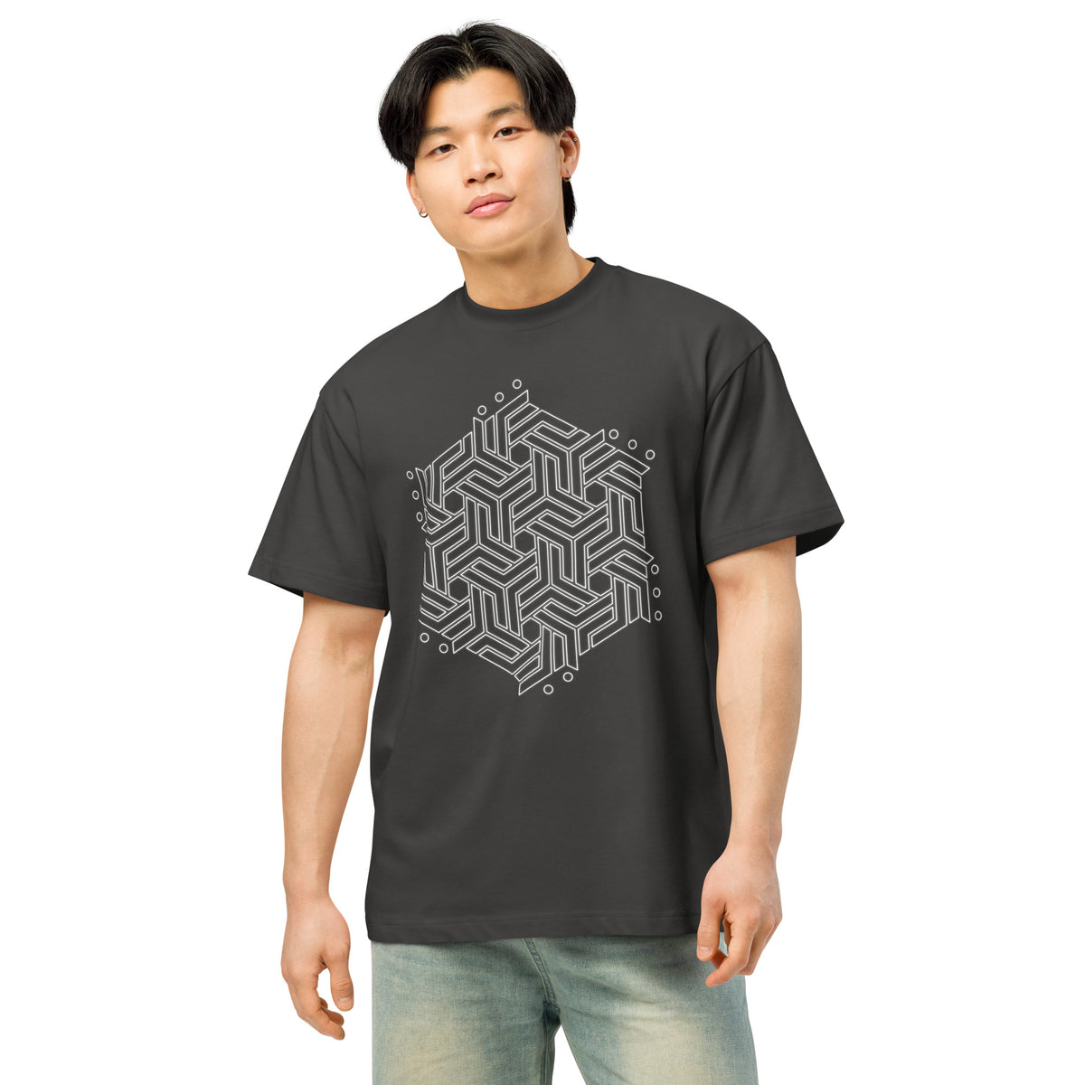 GeoTron B&W cotton box t-shirt in Vintage Black, front view on a model: white hexagon of interlocking chevrons