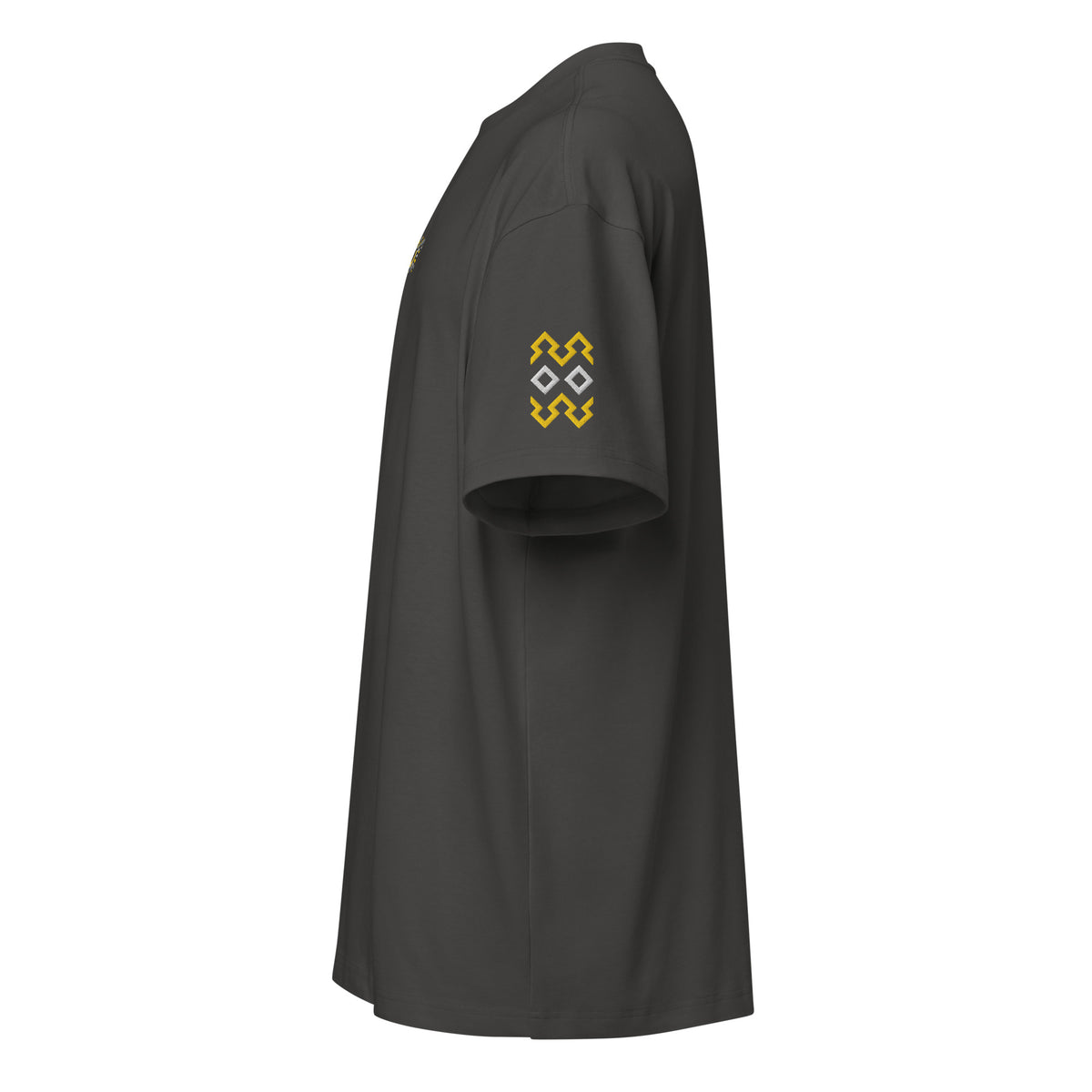 Owl embroidered box tee in Vintage Black, left side: two yellow stepped zigzags and two white diamonds on the sleeve