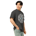 Broken Hex Core cotton box t-shirt in Vintage Black, right front view on a model: the cell disc print seen from the side