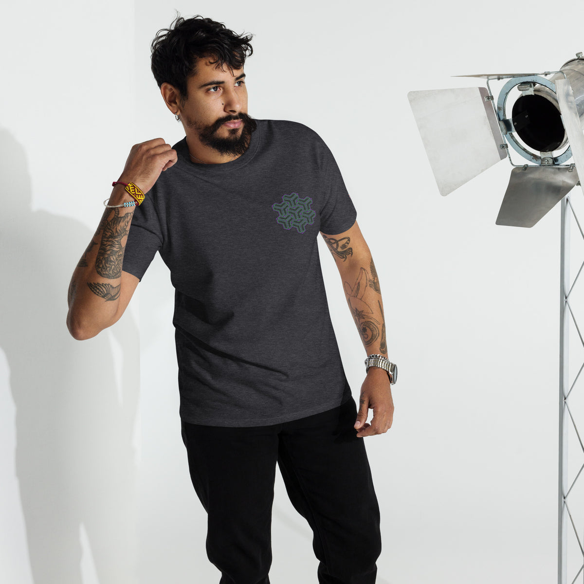 Neural Star Tree premium heavyweight t-shirt in Charcoal Heather, front view on a model: TreeStar small on the left chest
