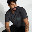 Neural Star Tree premium heavyweight t-shirt in Charcoal Heather, front view: TreeStar small on the left chest