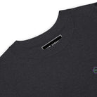 Neural Star Tree premium heavyweight t-shirt in Charcoal Heather, close-up at the collar: the HIVE VISIONS neck label