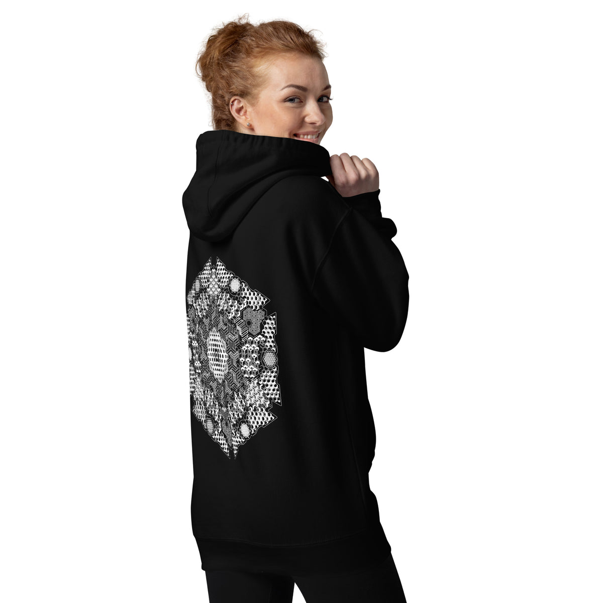 GeoDNA B&W unisex cotton hoodie in Black, back view at an angle on a model: white hexagon artwork
